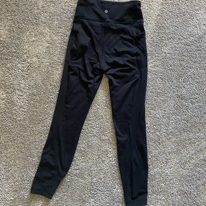 Black size 6 Lululemon insulated mesh leggings